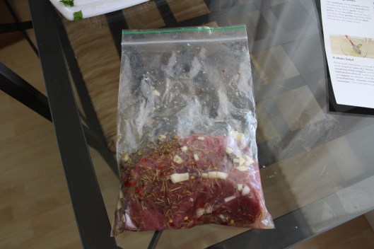 I made a meat marinade with some oregano, rosemary, lemon, garlic and olive oil. I was to marinade it for 5 minutes room temp or put it in the fridge for an hour. The next time I make it, I will marinade the meat first.