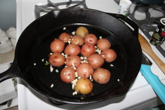 When the steak was done, I put it on a time out (to rest) and in the same pan, I cooked my potatoes. The recipe still had it on medium heat but I should have cranked that sucker up to high to achieve my golden brown rounds. 